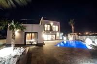  Недвижимость в Испании,Новые виллы на берегу моря от застройщика в Кампоамор - Изображение #1, Объявление #852041