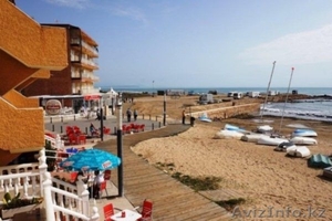 Недвижимость в Испании, Квартира на первой линии пляжа в Ла Мата,Торревьеха - Изображение #1, Объявление #1532197