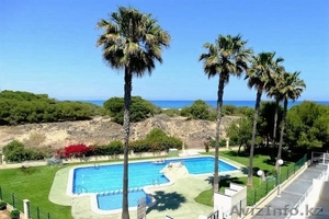 Недвижимость в Испании, Квартира на первой линии пляжа от застройщика в Ла Мата - Изображение #1, Объявление #1247656