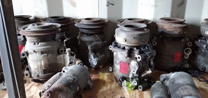 Mitsubishi Montero Sport  компрессор кондиционера.